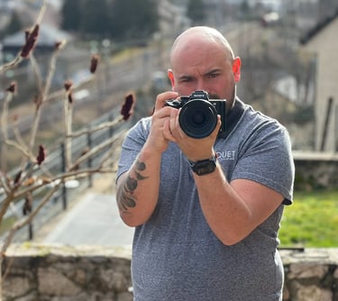 a man taking a picture of himself taking a picture of himself