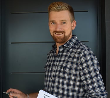 a man holding a sign that says,'i am sorry to see the sign