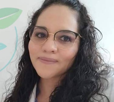 a woman in a lab coat and glasses