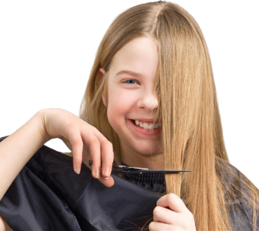 Child with fresh haircut and happy smile.