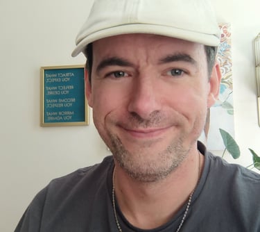 a man with a hat on a white background