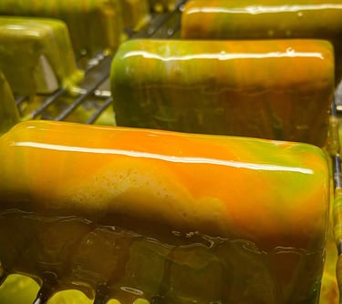 Multicolor glazed entremet with green and orange colours