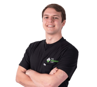 Dr. Sean smiling in his headshot