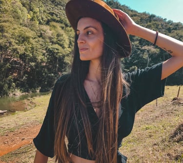 a woman in a hat and a hat