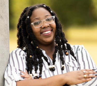 a mental health therapist in Indiana with a large smile on her face
