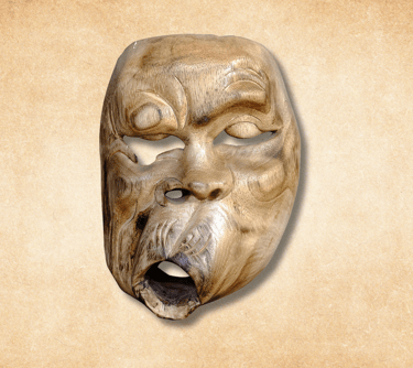 a wooden decoration of mask