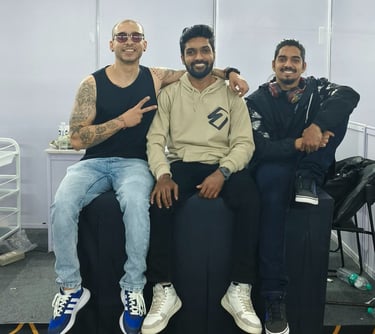 a group of men sitting on a couch