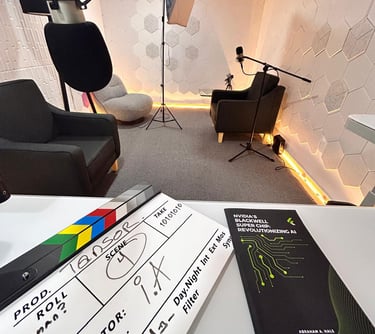 Professional podcast studio with movie clapperboard, studio lighting, microphones, and soundproof walls.