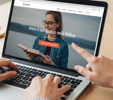 a person holding a book and pointing at a laptop