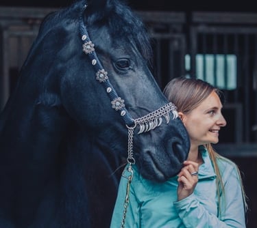 Frisian mare with her human friend after acupressure for horses