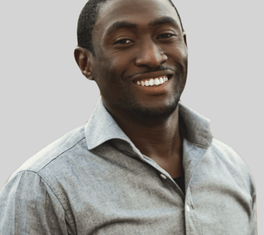 a man in a gray shirt and a white shirt