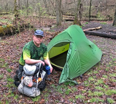 The author with his backpack and tent