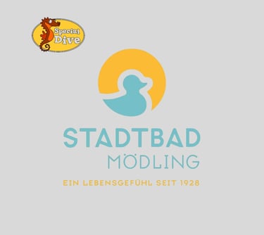 a logo for a dog sitting on a table
