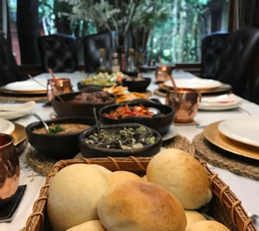 Family table with bread and condiments