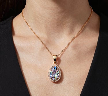 woman in black blazer with brown hair