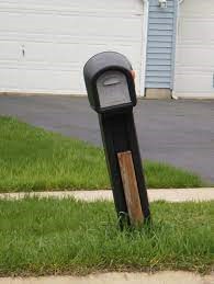 Mailbox on a leaning post