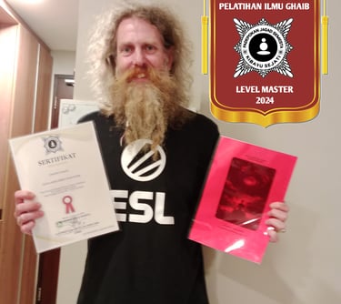 a man holding up a certificate of qualification in the Supernatural Sciences of the Universe and a workbook
