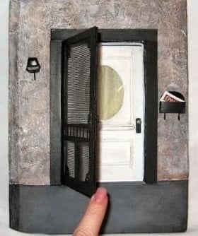 Altered book with a door