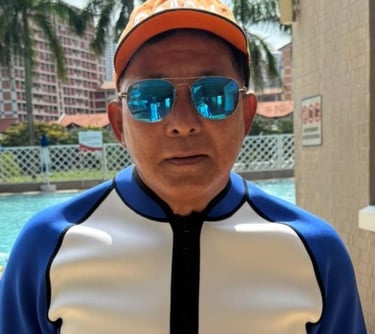 coach raymond oyougu aquatics
