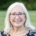 Technically John is the broker but Christine rules the roost!