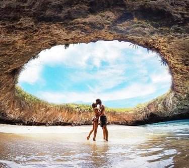 a couple kissing in a cave cave