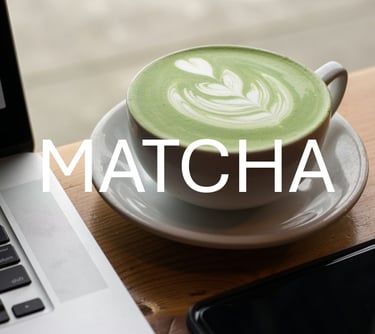 Photo of a cup of matcha latte, with the words 'MATCHA' overlayed on top in white
