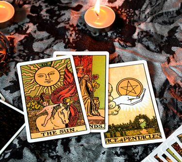 a tarot of tarot cards with candles and candles