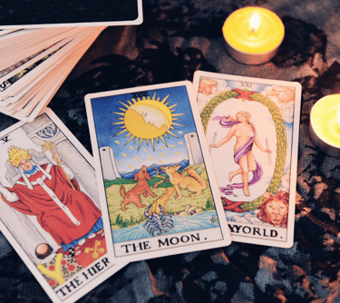 a tarot of tarot cards with candles and candles