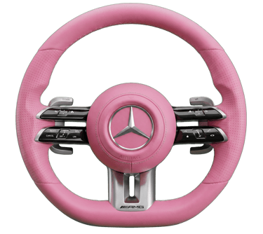 Custom pink leather Mercedes-AMG steering wheel with silver trim and logo on a black background.