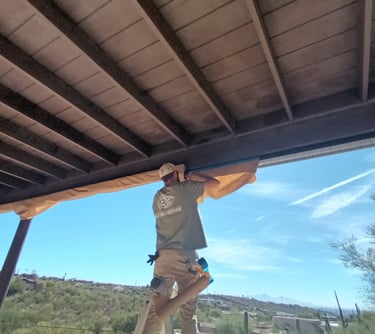 Best Handyman Tucson - Professional installer on a ladder