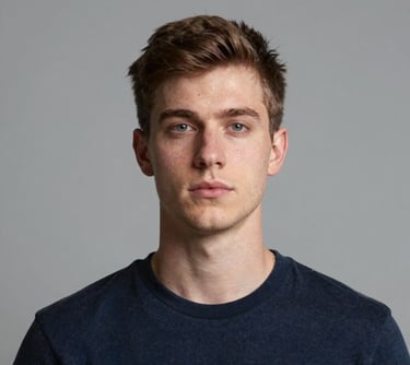 man standing near white wall