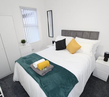 Double bedroom with white walls