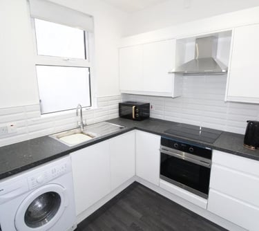 White kitchen with appliances