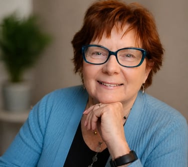 a senior red hair lady with glasses, named Suzie Docherty from KCR community resources