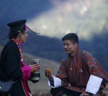 Bhutanese-way-of-offering-local-rice-wine-honoring-the-guests
