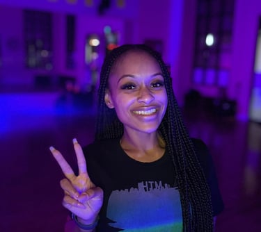 A dancer posing for a photoshoot.