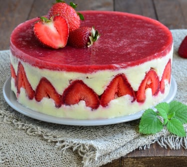 a cake with strawberries and strawberries on a table