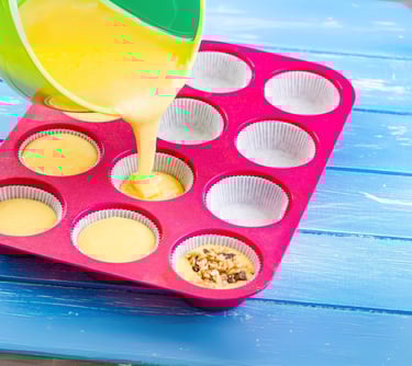 a person pouring batter batter batter batter batter batter batter batter batter batter batter batter batter