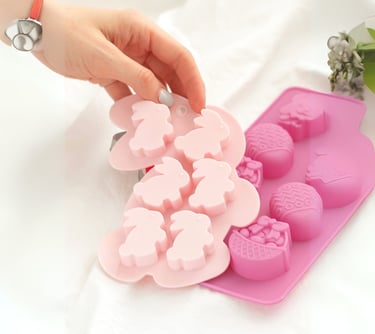 a person holding a pink plastic mold mold mold mold mold mold mold mold mold mold