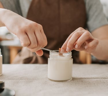 a person is holding a spoon and spoon in their hand