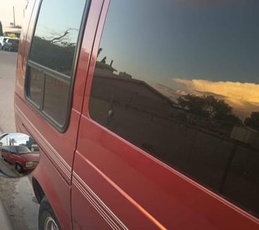 a van parked on the side of a street