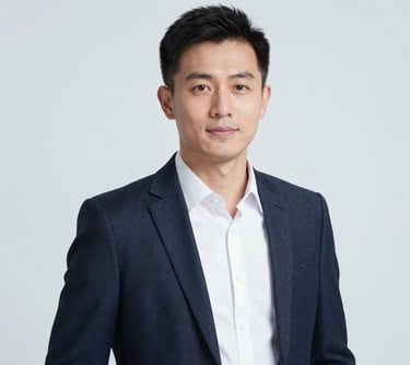 Professional headshot of a man in his 30s, modern professional attire, representing innovation and technology. Background in #F5F8FA, bright and clean composition.