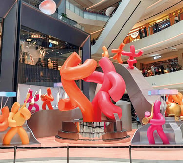 Colorful Fiberglass Tube-Man Sculptures for Round Tube People Art Exhibition Mall Atrium in Guiyang by DEFARA