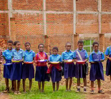 school children with food in Malawi