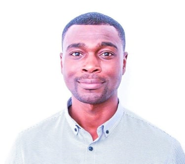 Employee health expert in a white shirt, posing for a photo