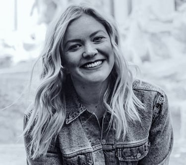 a woman with blonde hair and a denim jacket, wedding planner