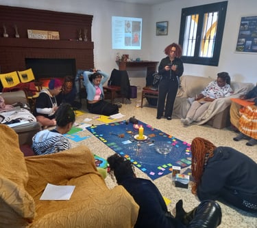 un grupo de mujeres afro en un taller afrofeminista