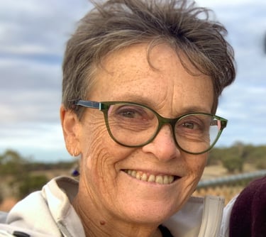 Face of smiling woman wearing glasses