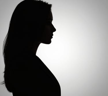 woman wearing black scoop-neck long-sleeved shirt