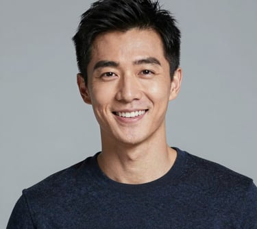 man standing near white wall